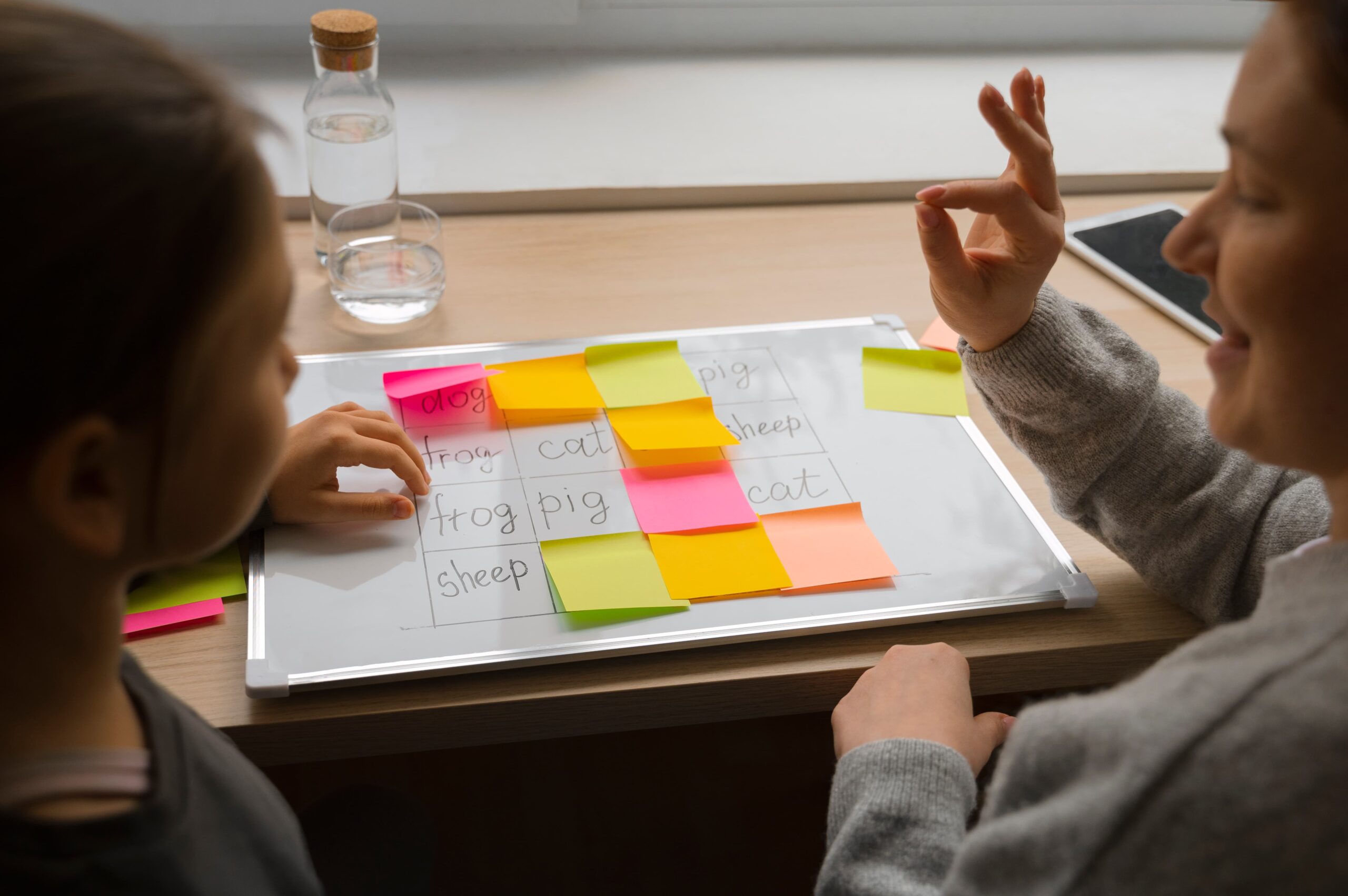 high angle woman girl playing memory game 1 scaled